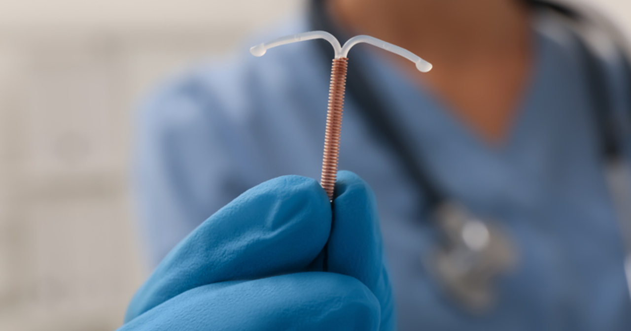 Provider holding IUD