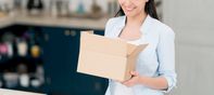 Holding a box in the kitchen compressed
