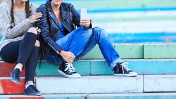 Couple sitting on steps