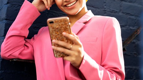 Looking at the phone 2 cropped